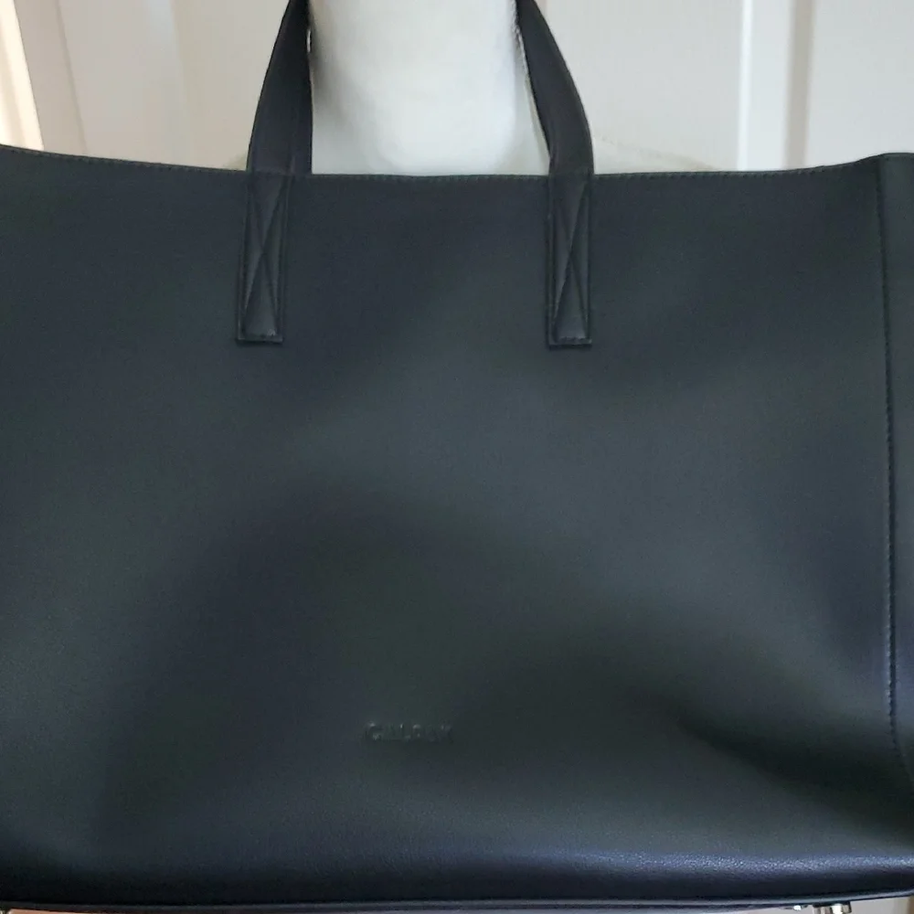 Calpak Sleek Black Laptop Bag for Women